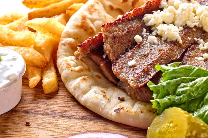 Miami Grill, Florissant meat, bread and fries with salad leaves
